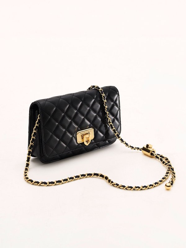 Black Cressida Quilted Push-Lock Clutch | CHARLES & KEITH