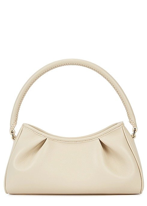 Dimple cream leather top handle bag