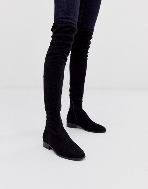 Kayden flat thigh high boots in black | ASOS