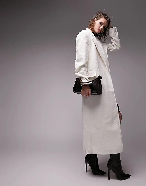 wrap belted maxi coat in white