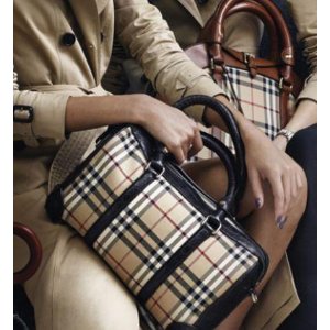 with Burberry Handbags & Shoes Purchase of $200 or More @ Neiman Marcus