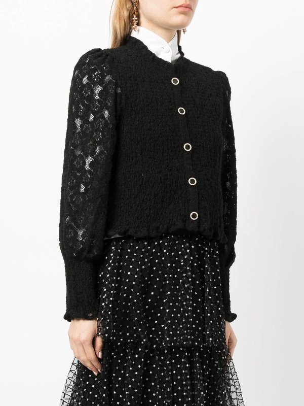 lace-sleeved blouse