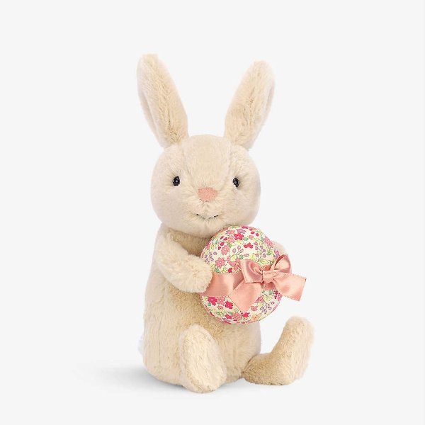 抱着碎花蛋庆祝复活节的兔兔