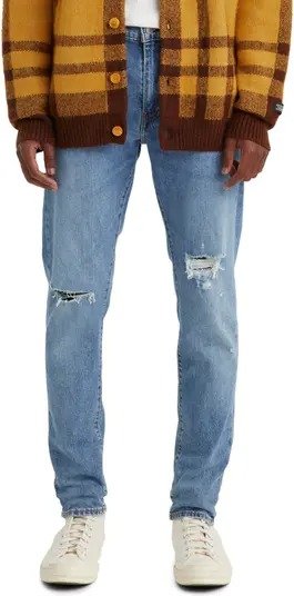 512™ Distressed Slim Tapered Jeans