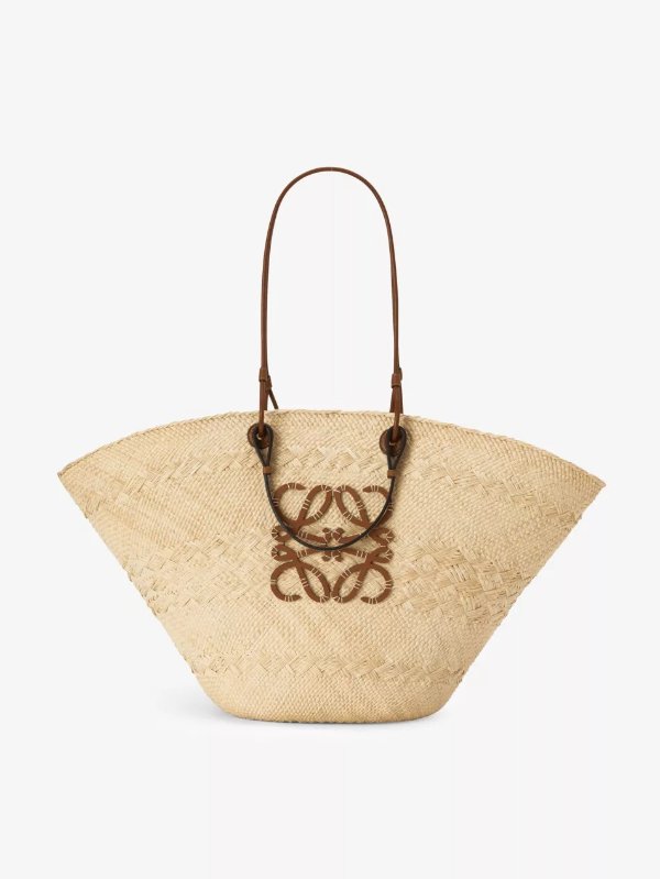 Paula’s Ibiza Anagram large iraca palm and leather basket bag
