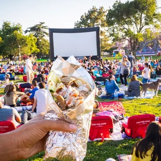 One General-Admission Ticket (Vaccinated Section) at Street Food Cinema (Up to 21% Off). 14 Options Available.