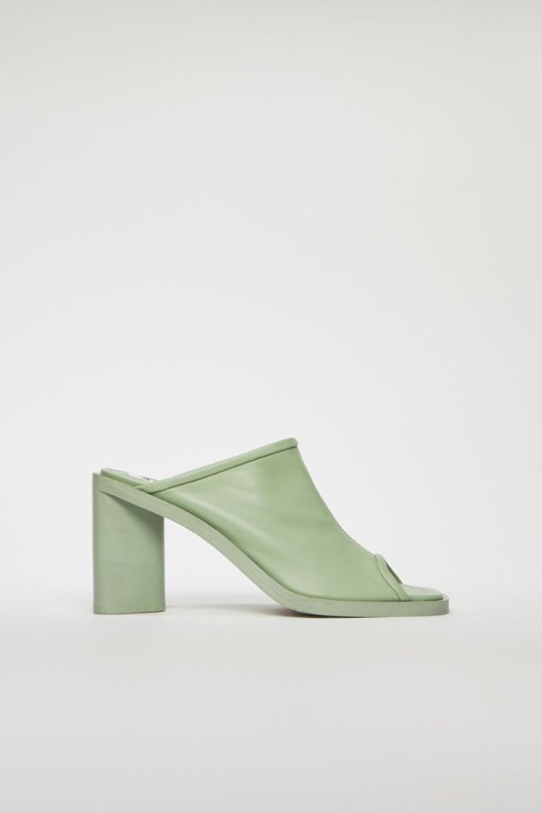 Open-toe leather mules Pale green