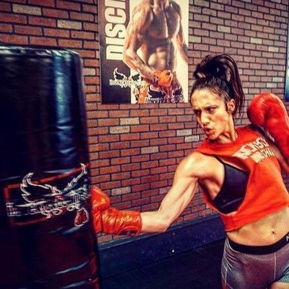 4 or 7 Kickboxing Classes with Personal-Training Session and Boxing Gloves at iLoveKickboxing.com (80% Off)