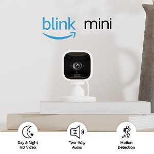 AmazonBlink Mini – Compact indoor plug-in smart security camera, 1080 HD video, motion detection, night vision, Works with Alexa – 3 cameras