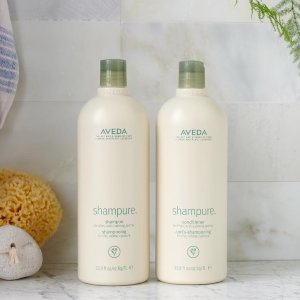 with Purchase of 2+ Litres Products @ Aveda