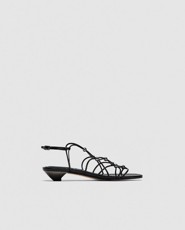 STRAPPY SANDALS WITH METAL DETAILS Details
