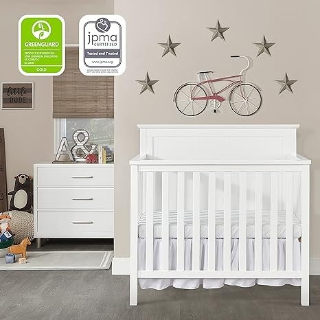 Ava 4-in-1 Convertible Mini Crib in White, Greenguard Gold Certified, Non-Toxic Finish, Comes with 1" Mattress Pad, with 3 Mattress Height Settings