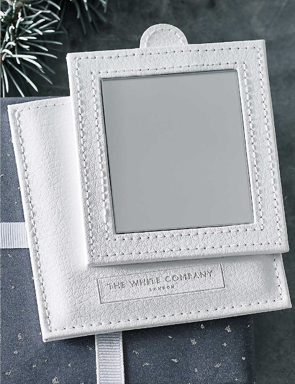 Compact bonded-leather mirror