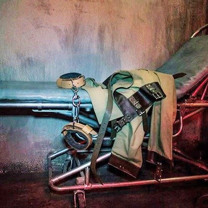 Insane Asylum or Bunker Live Escape Game for Four or Six at PanIQ Escape Room (Up to 49% Off)