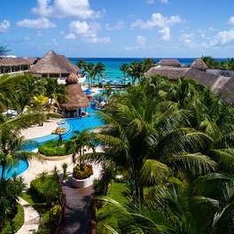 Stay at 4-Star The Reef Coco Beach in Quintana Roo, Mexico. Airfare not included.