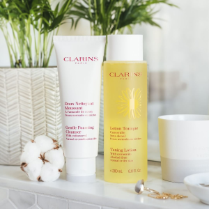 with purchase of $100 @ Clarins