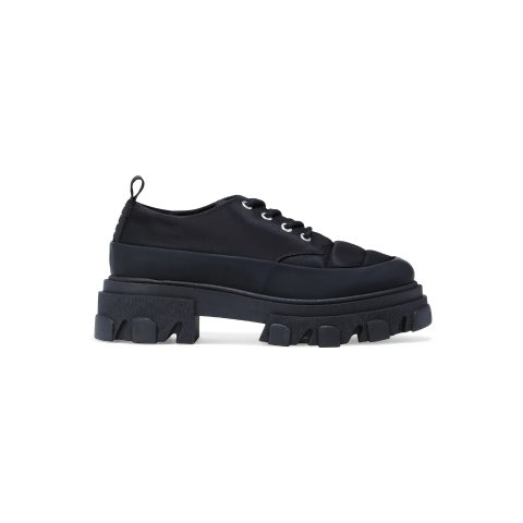 Rubber-trimmed quilted shell brogues
