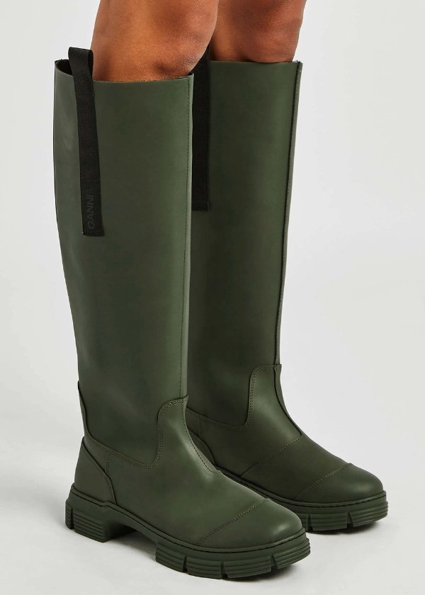 Dark green rubberised knee-high boots