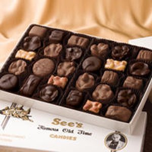 with purchase of $40 or more @ See's Candies