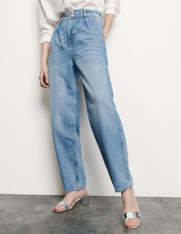 High-waisted jeans with pearl buttons