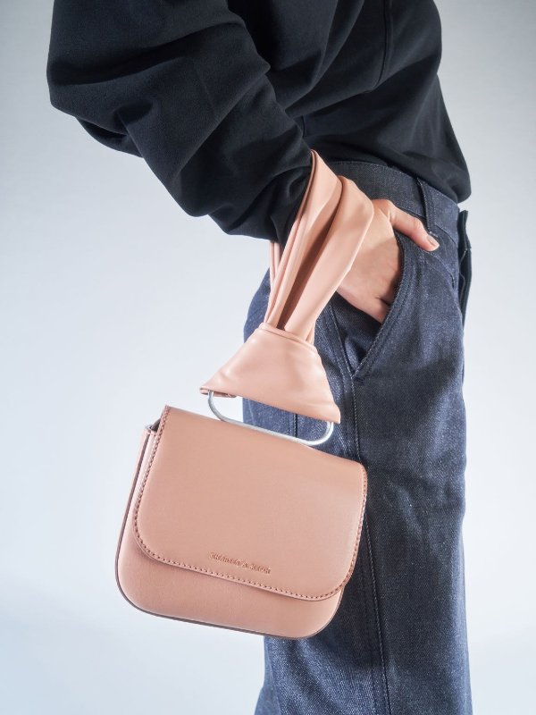Blush Knotted Wristlet Bag | CHARLES &amp; KEITH