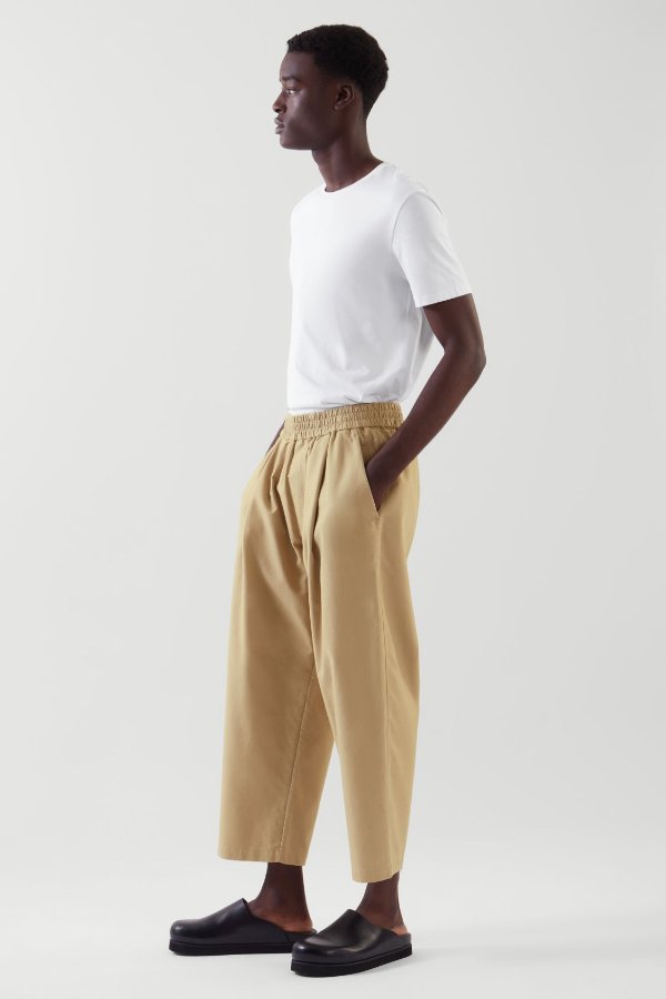 OVERSIZED-FIT ELASTICATED PANTS - BEIGE - Trousers - COS