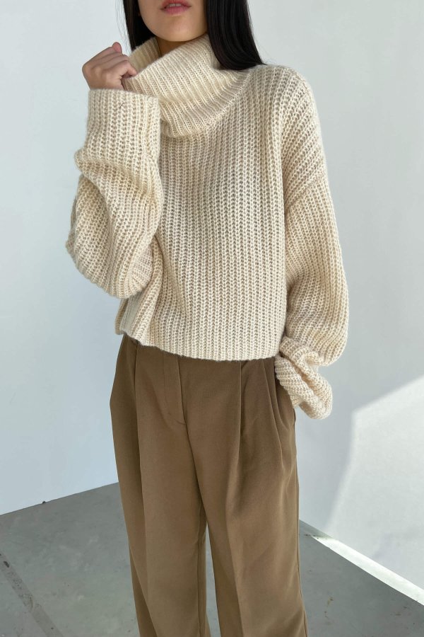 TURTLENECK SWEATER $68 Additional 15% off - discount applied at checkout SW-7583-W Creme Brulee;Warm Beige SW-7583-W $68.00