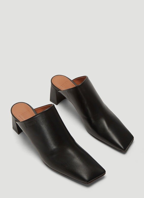 Boomerang Leather Mules in Black
