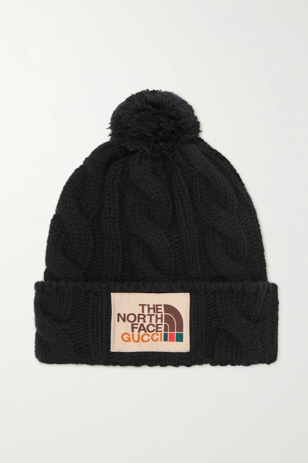 + The North Face appliqued cable-knit wool beanie