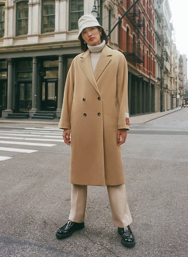 the slouch Oversized, double-breasted wool coat 原文