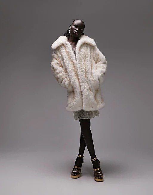 faux fur coat in cream