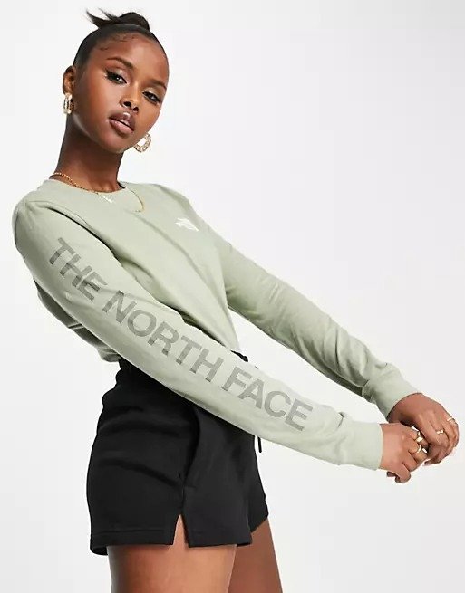 long sleeve top with simple logo in green