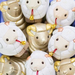 commemorative sheep and ram made in Japan of kimono silk flecked with real gold on any purchase over $100 @ tatcha