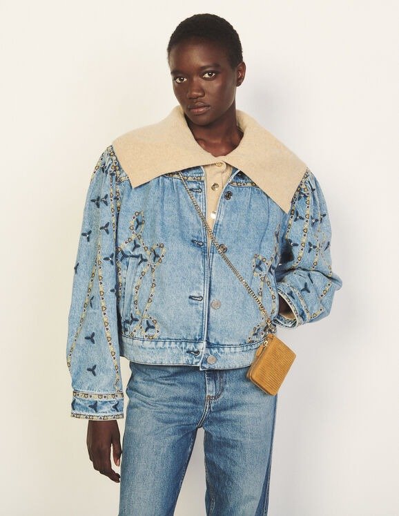 Denim jacket with embroidery and studs