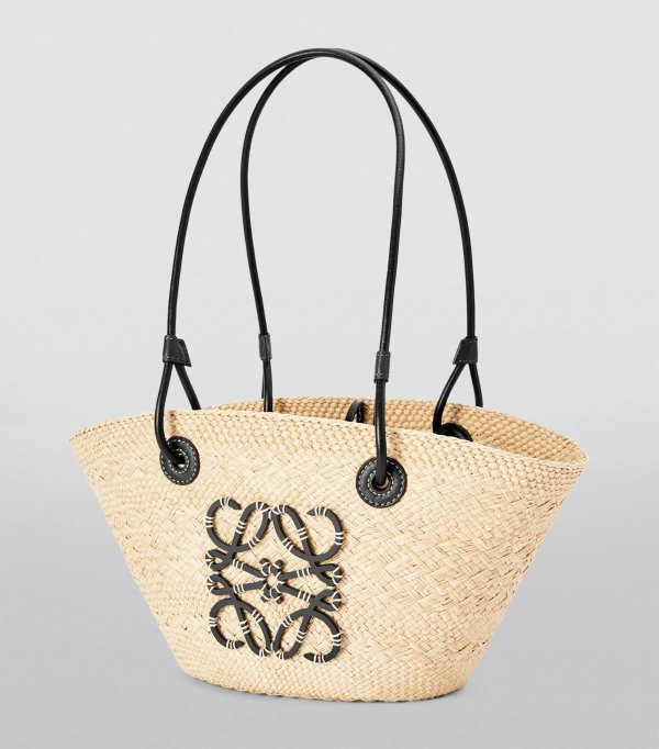 x Paula’s Ibiza Small Woven Anagram Basket Bag