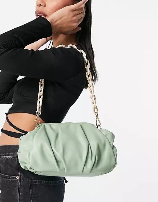 oversized ruched clutch bag in sage green with detachable shoulder chain 