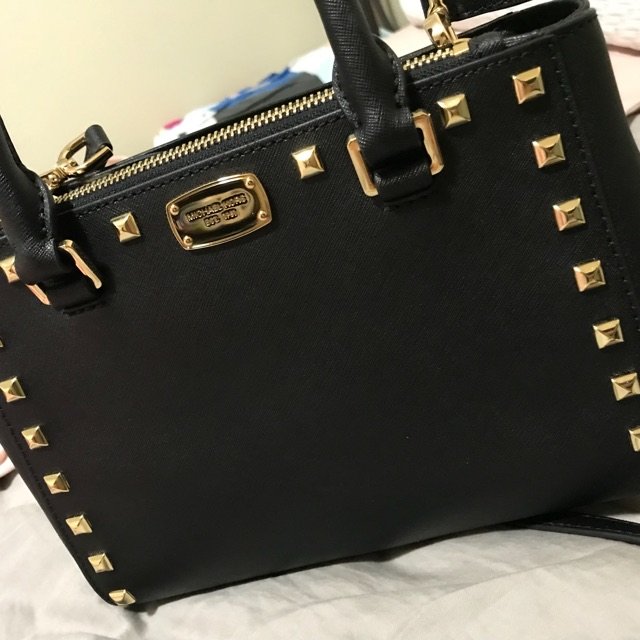 Michael Kors 迈克.科尔斯