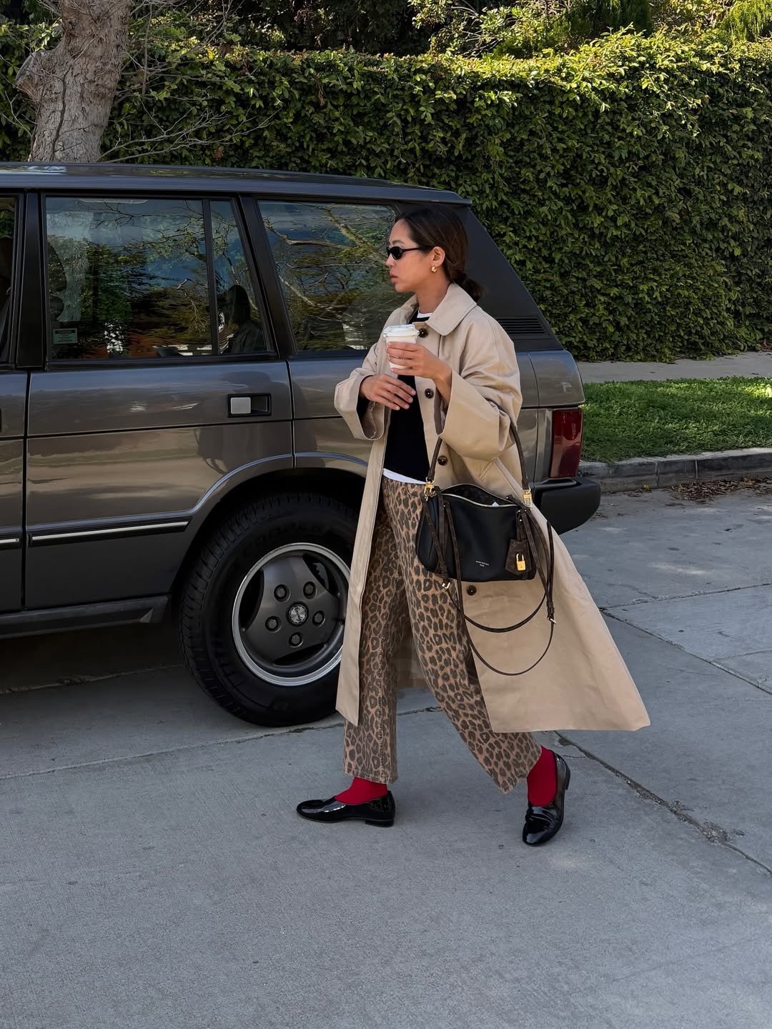 Aimee Song in low-heeled flats